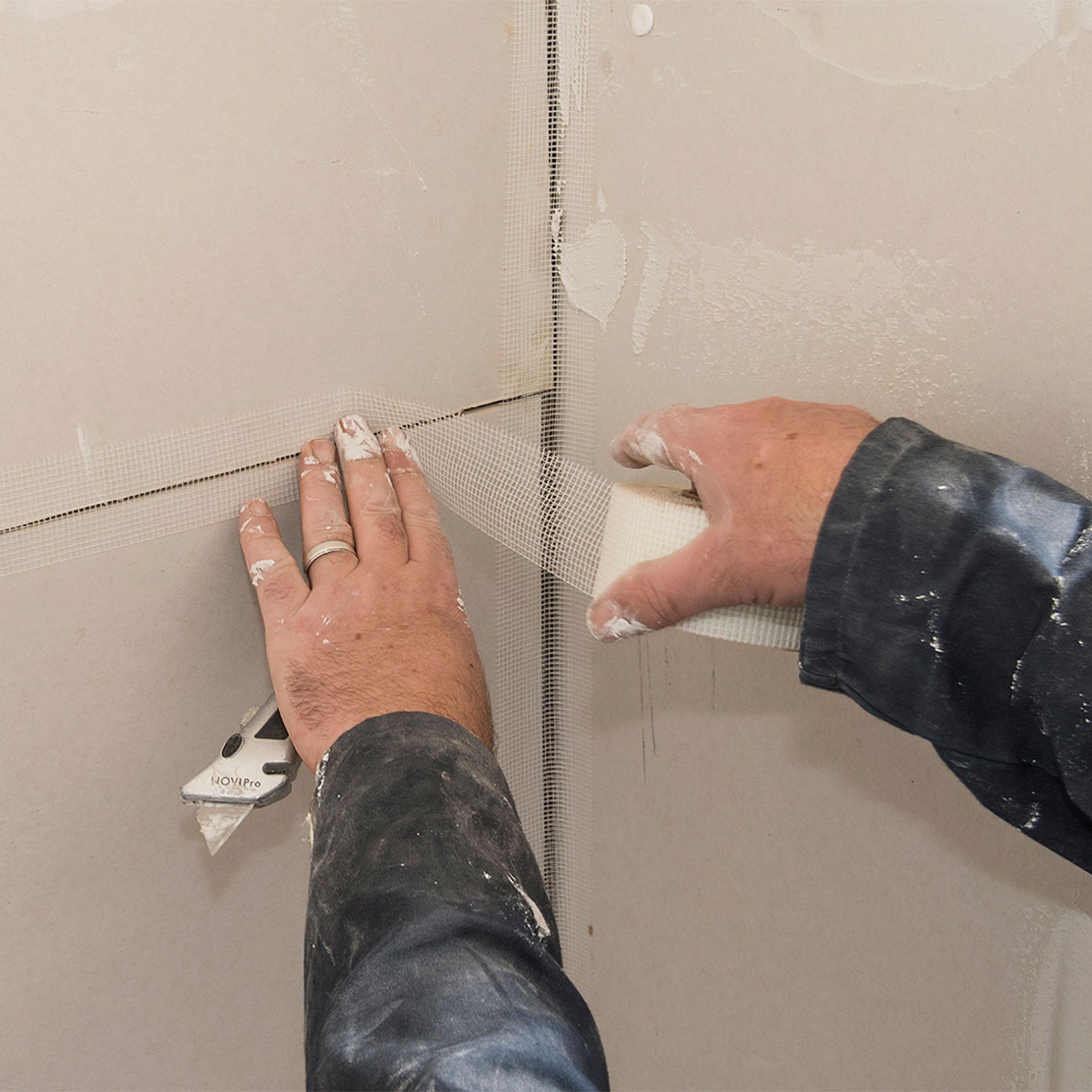 Step 16 dryzone system apply scrim tape