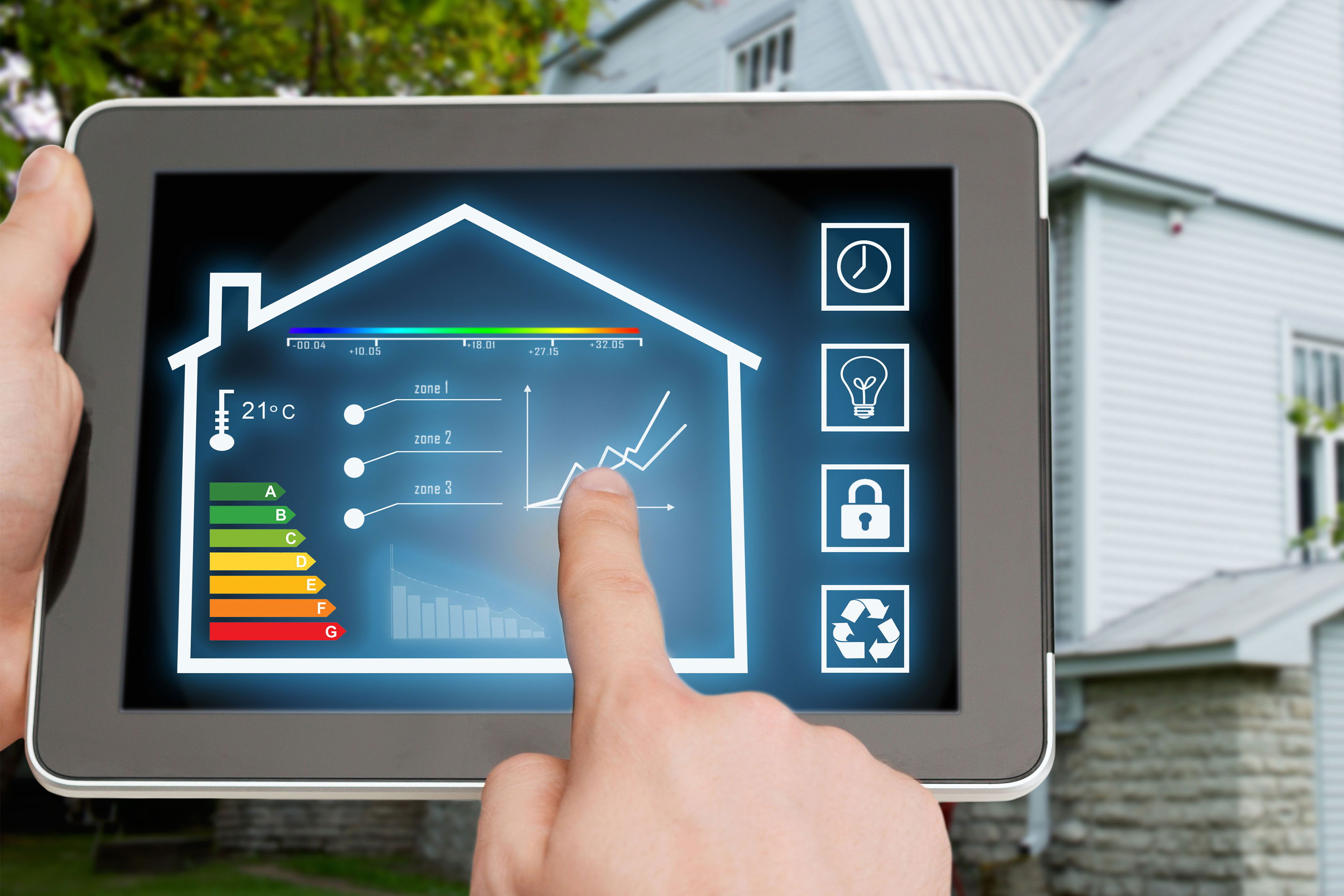 A man checks a house's EPC rating using software on a tablet computer. In the background, a white house.