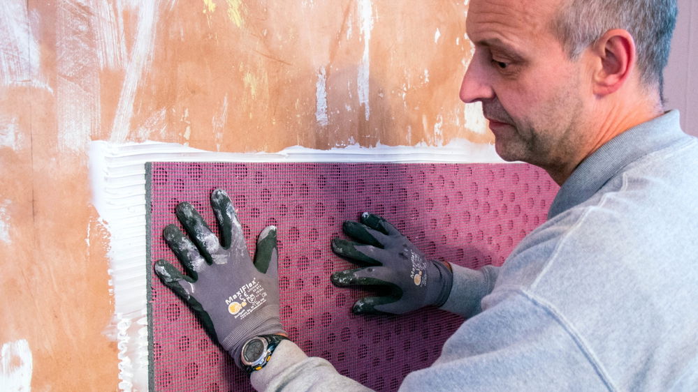 A contractor installing Ultrotherm IWI