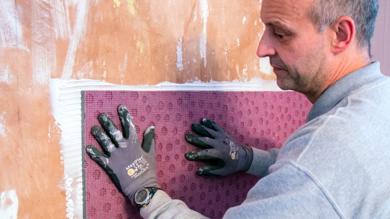 A contractor installing Ultrotherm IWI
