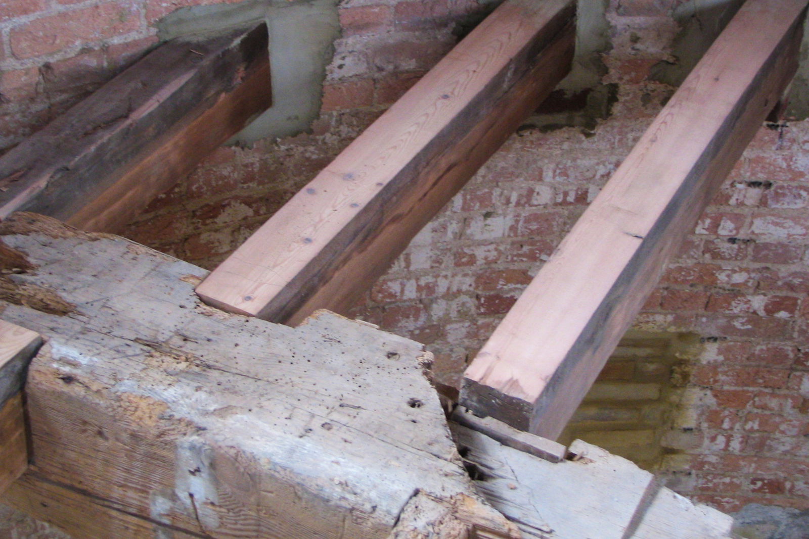 The timber beams inside a windmill.