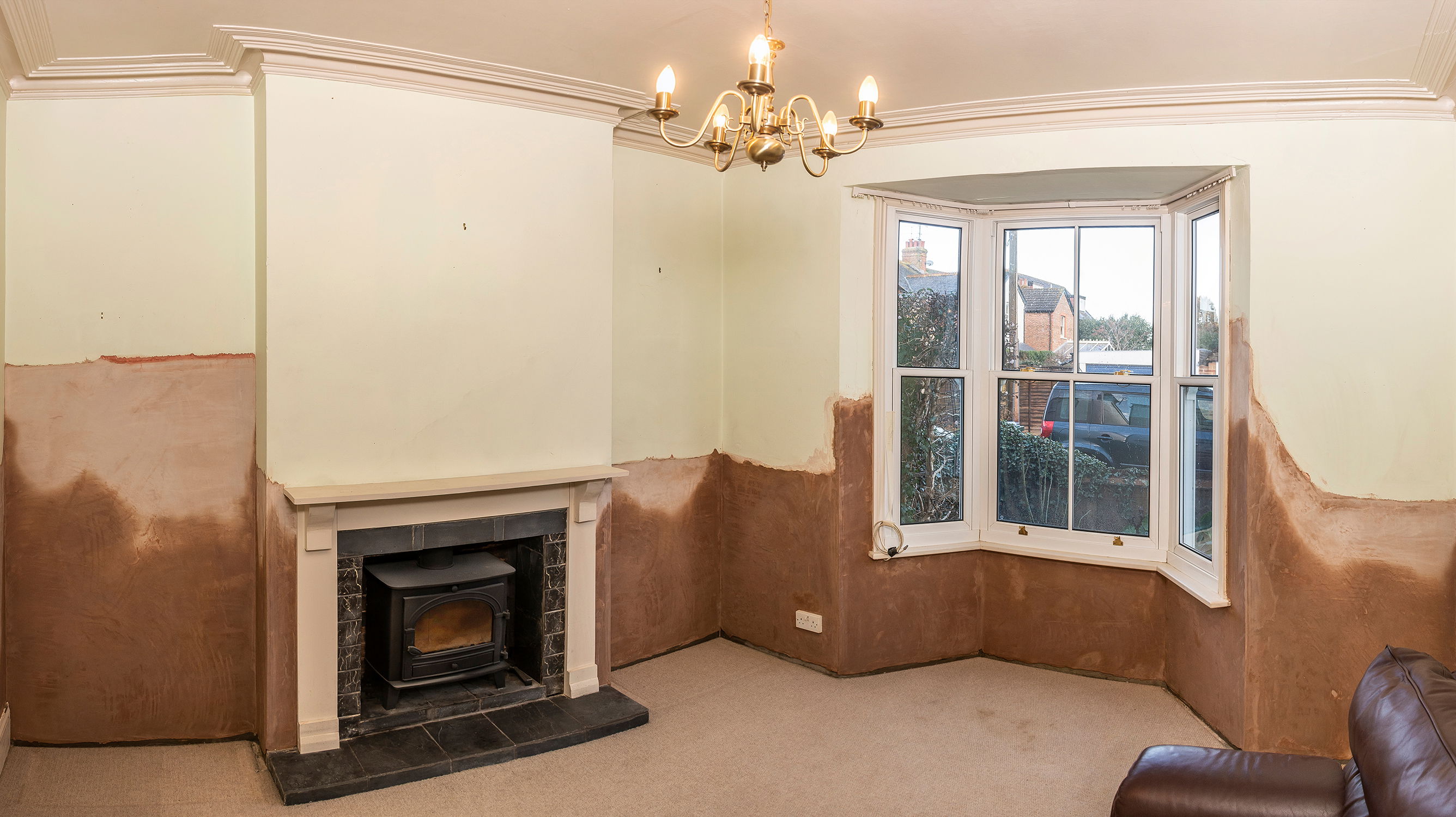 A living room replastered and ready for decoration.
