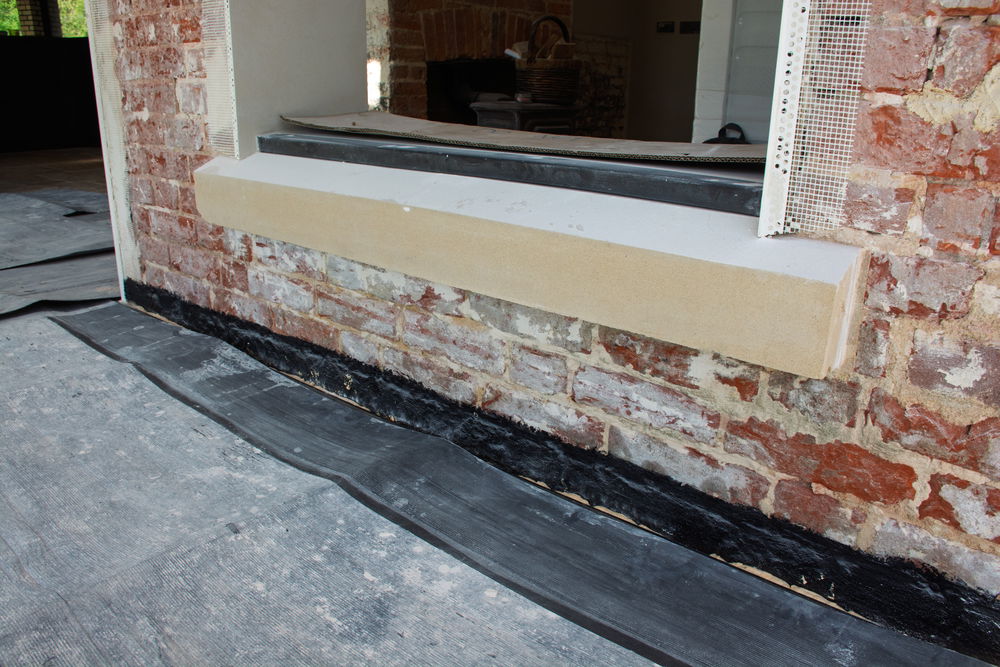 Drybase LDPM applied to a bare brick wall.