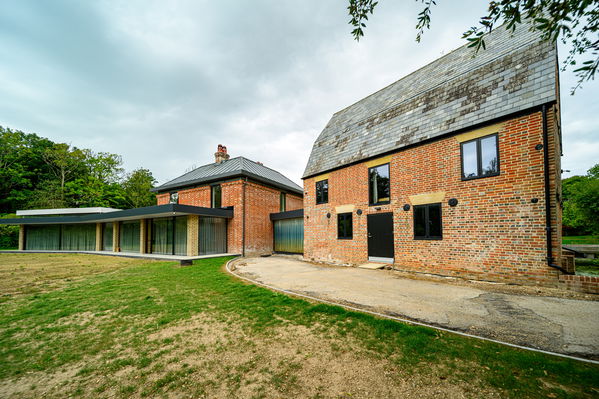 The Old Mill exterior angled view - Photograph by Paul French