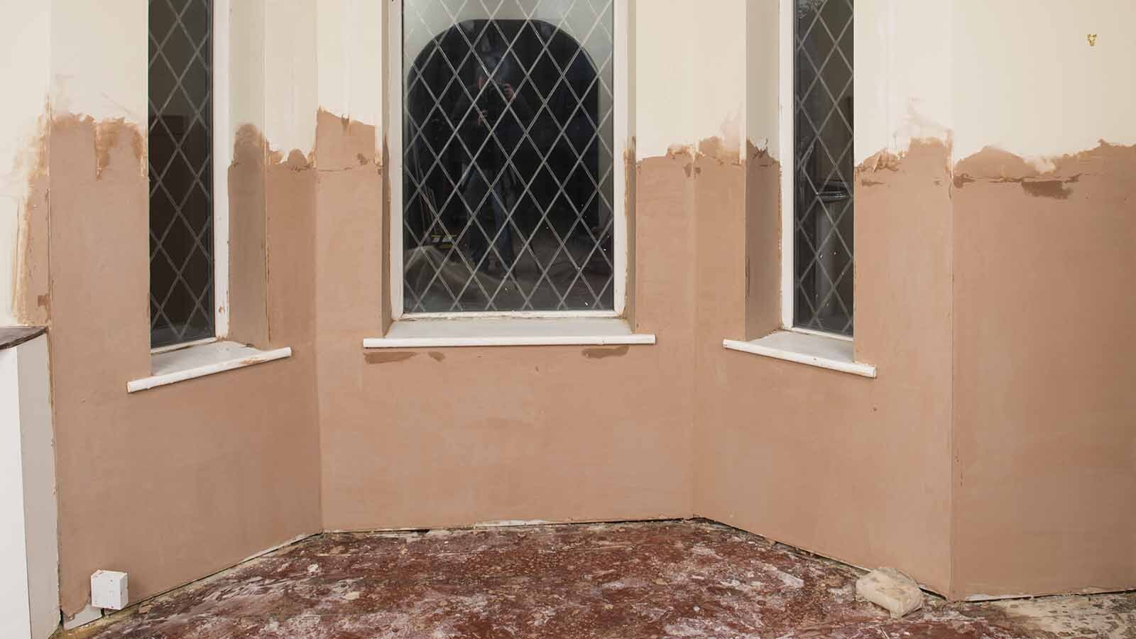 The wall after the installation of Dryzone Express Replastering System.