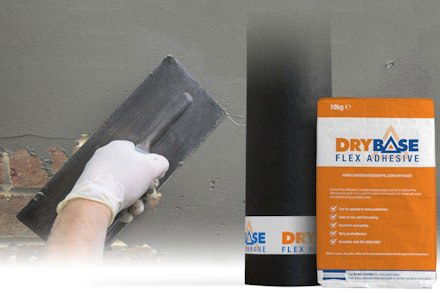 Drybase flex being applied to a wall