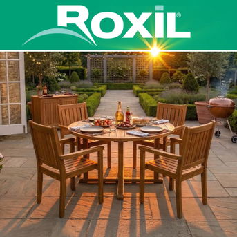 Garden chairs and table in the summer sun