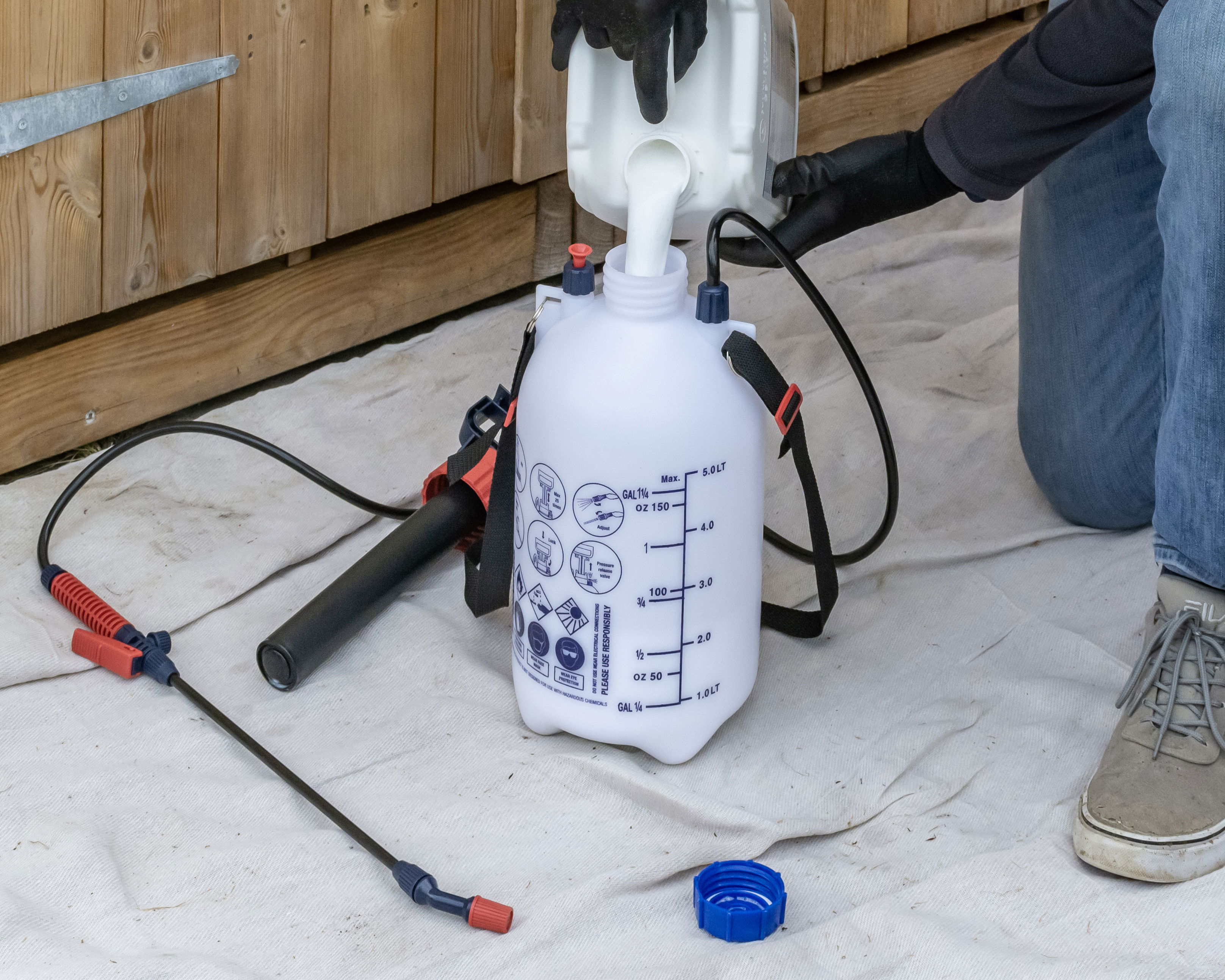 05 Roxil Wood Protection Liquid pouring into sprayer 5x4