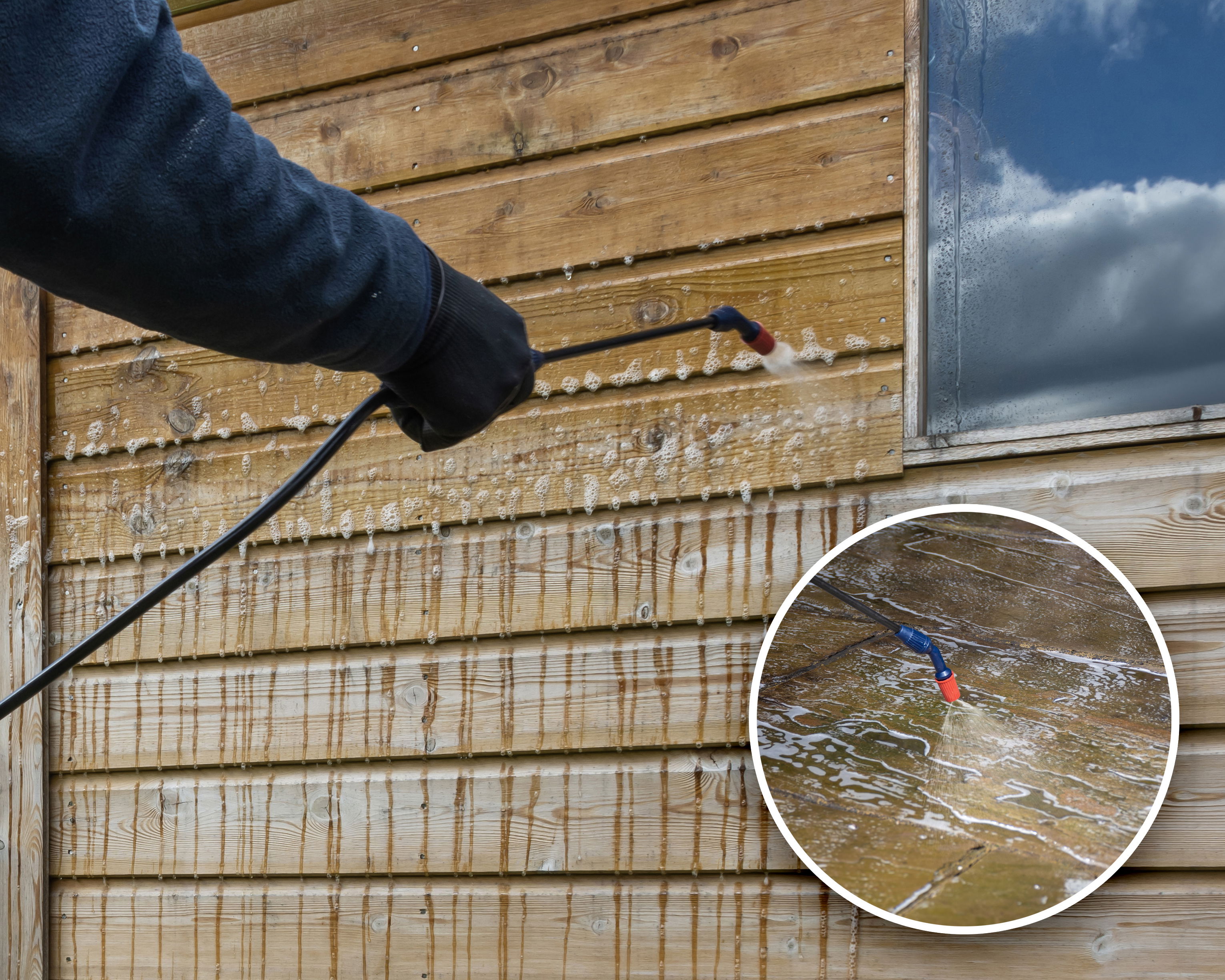 A contractor spraying a wood panel shed with Roxil 100.