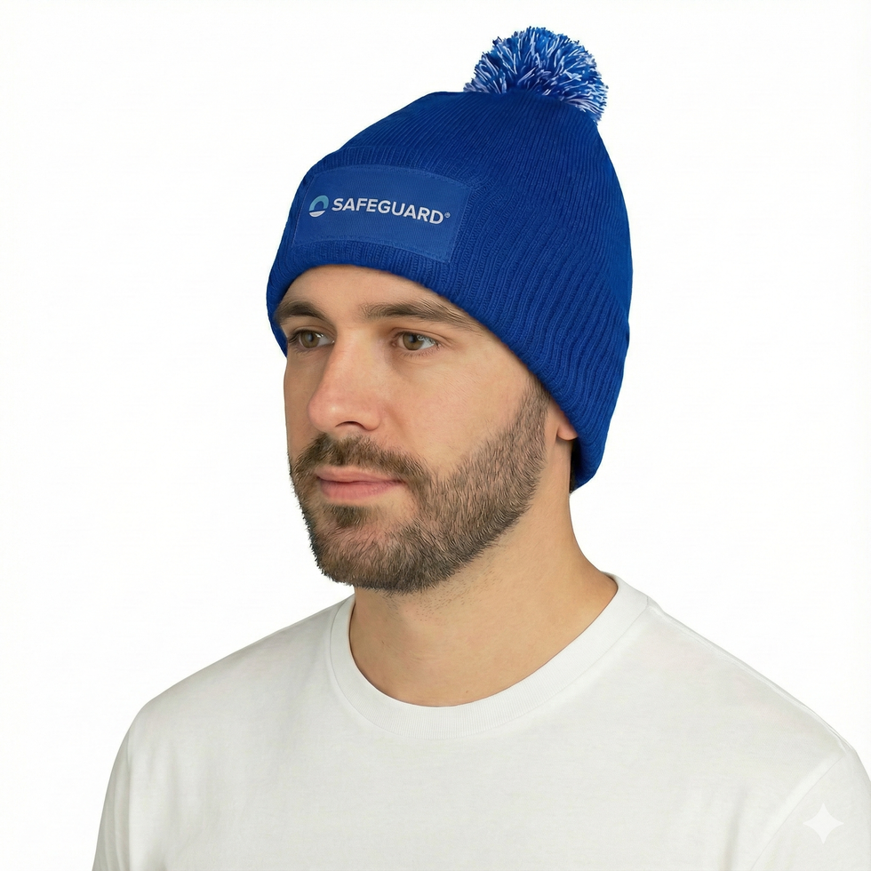 Safeguard Beanie Hat with Bobble worn by Craig Studio Shot with logo printed on the patch